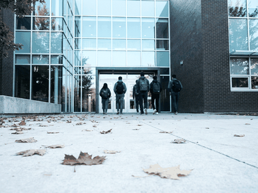 Students walking into a Canadian college campus, a school on the DLI list